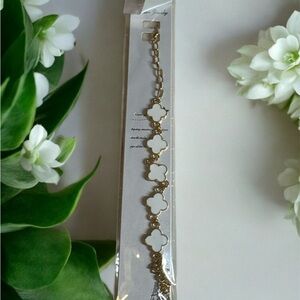 Elegant Gold and White Clover Bracelet
